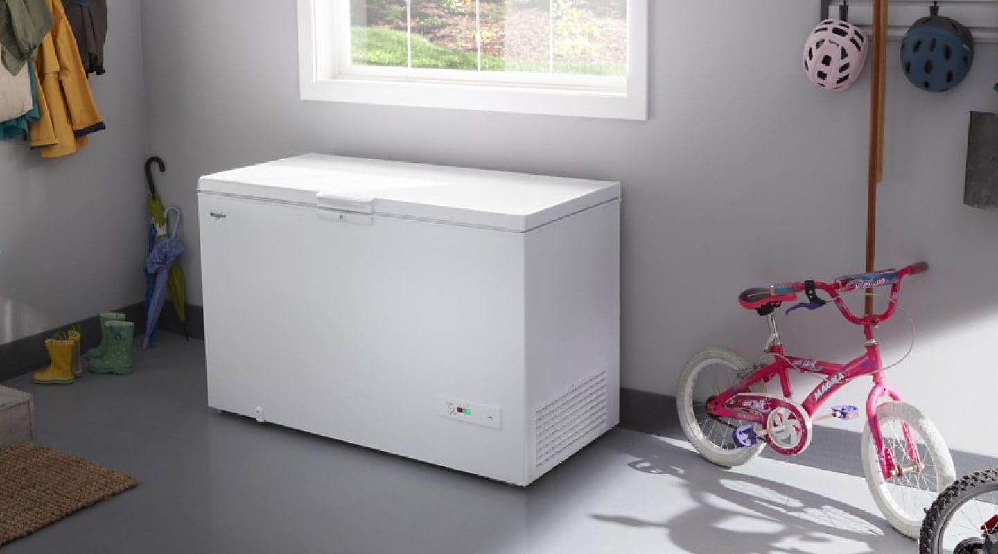 White Whirlpool® Chest Freezer beneath window in garage White Whirlpool® Chest Freezer beneath window in garage
