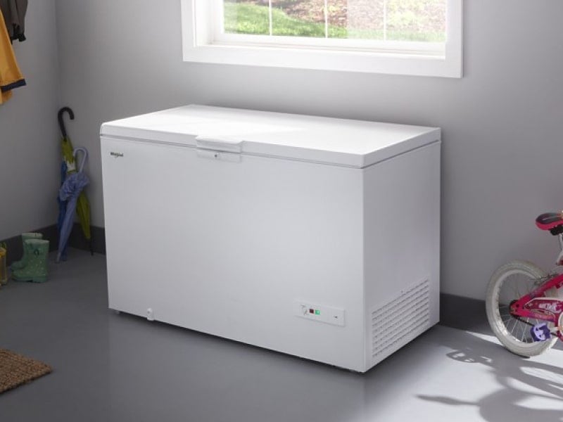 White Whirlpool® Chest Freezer beneath window in garage White Whirlpool® Chest Freezer beneath window in garage
