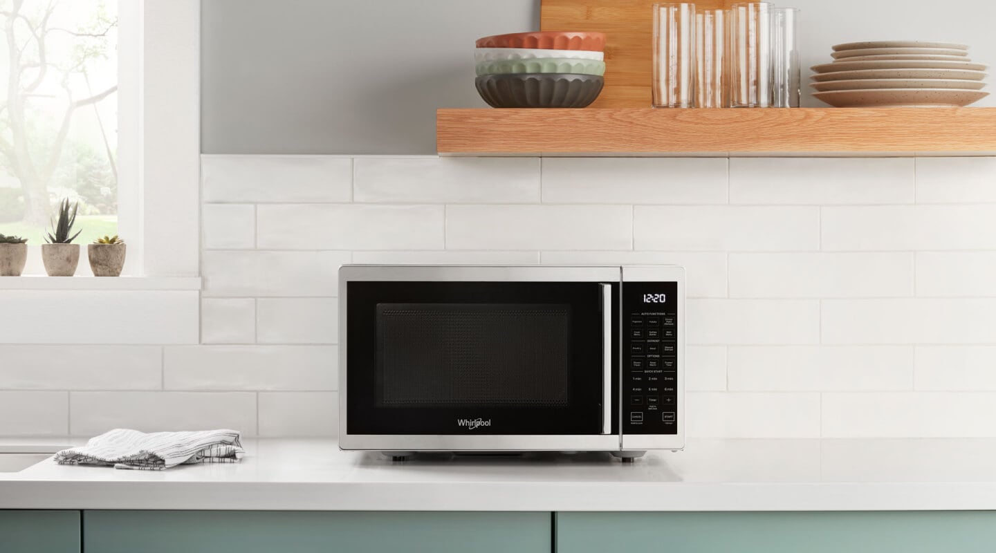 Whirlpool® microwave on a kitchen counter Whirlpool® microwave on a kitchen counter