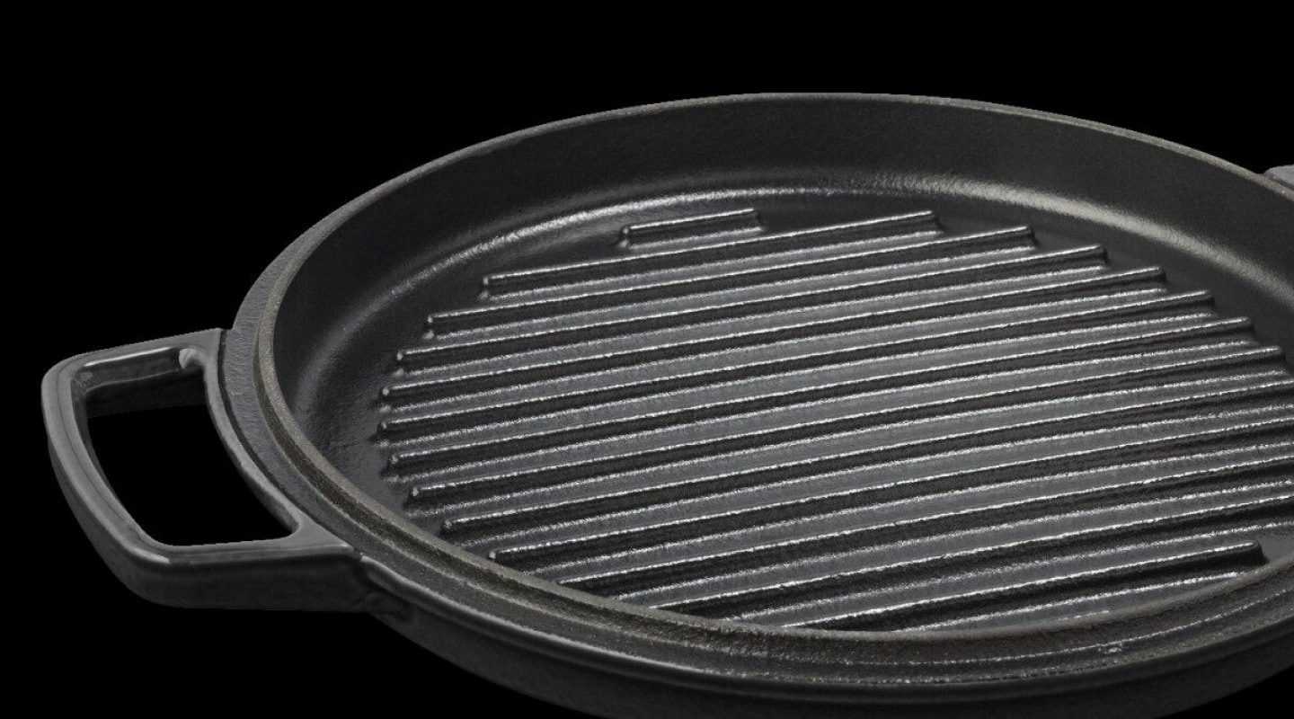 A close up image of a cast iron pan with ridges A close up image of a cast iron pan with ridges