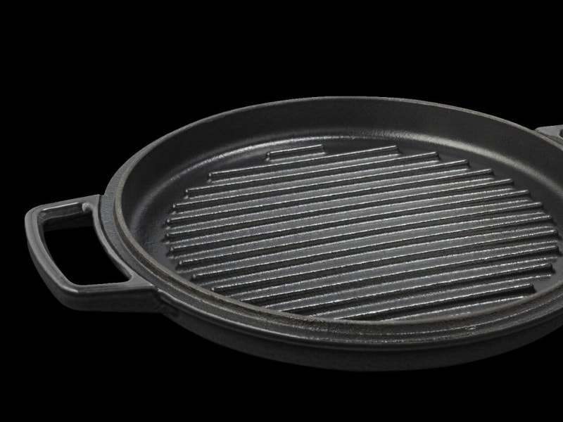 A close up image of a cast iron pan with ridges
