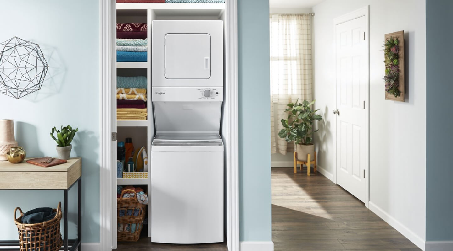 A Whirlpool® Stacked Laundry center in a closet
