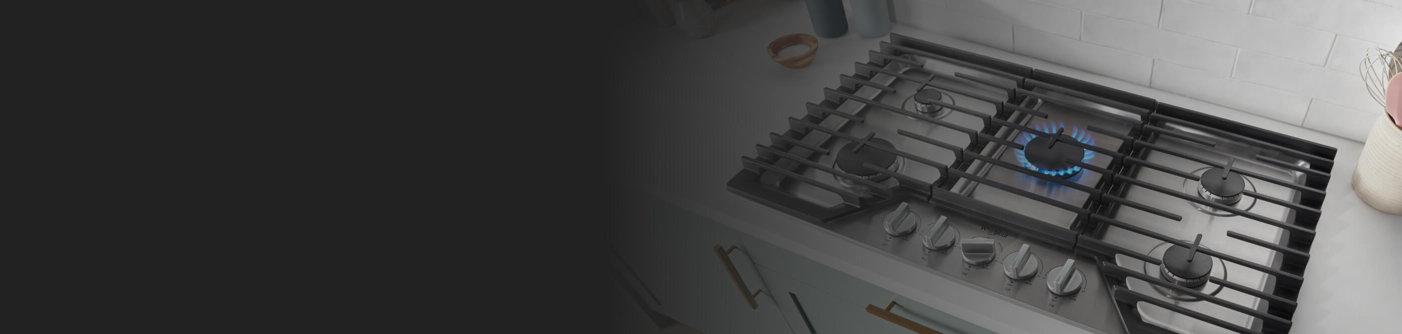 Top view image of cooktop set into white countertop