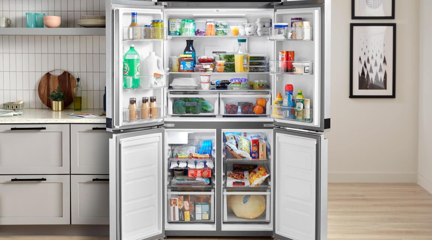 An open 36-inch Wide Counter Depth 4 Door Refrigerator