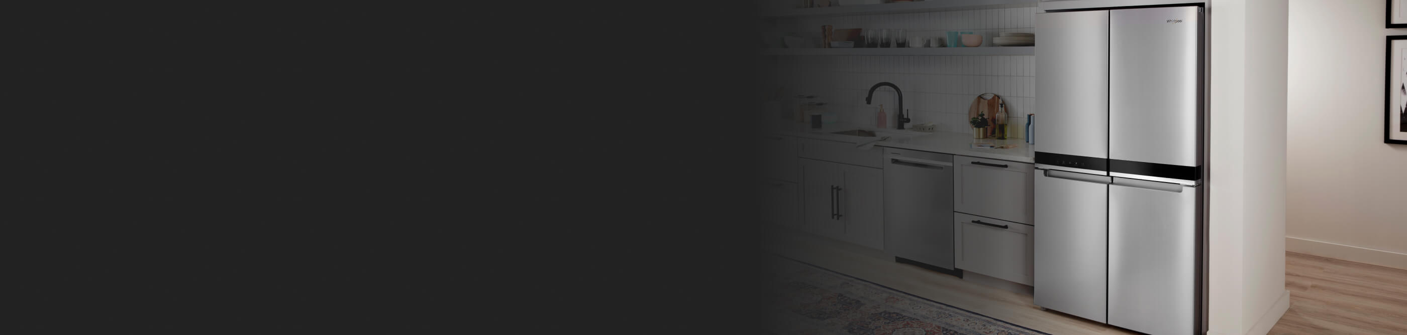 A kitchen with a Whirlpool® 4 Door Refrigerator in stainless steel