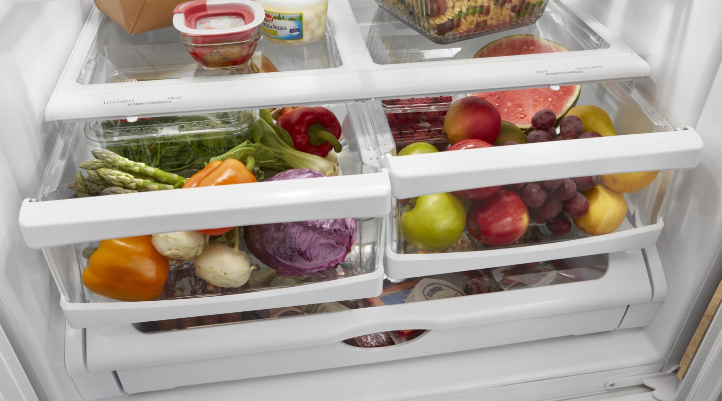 Open crisper drawers filled with food Open crisper drawers filled with food
