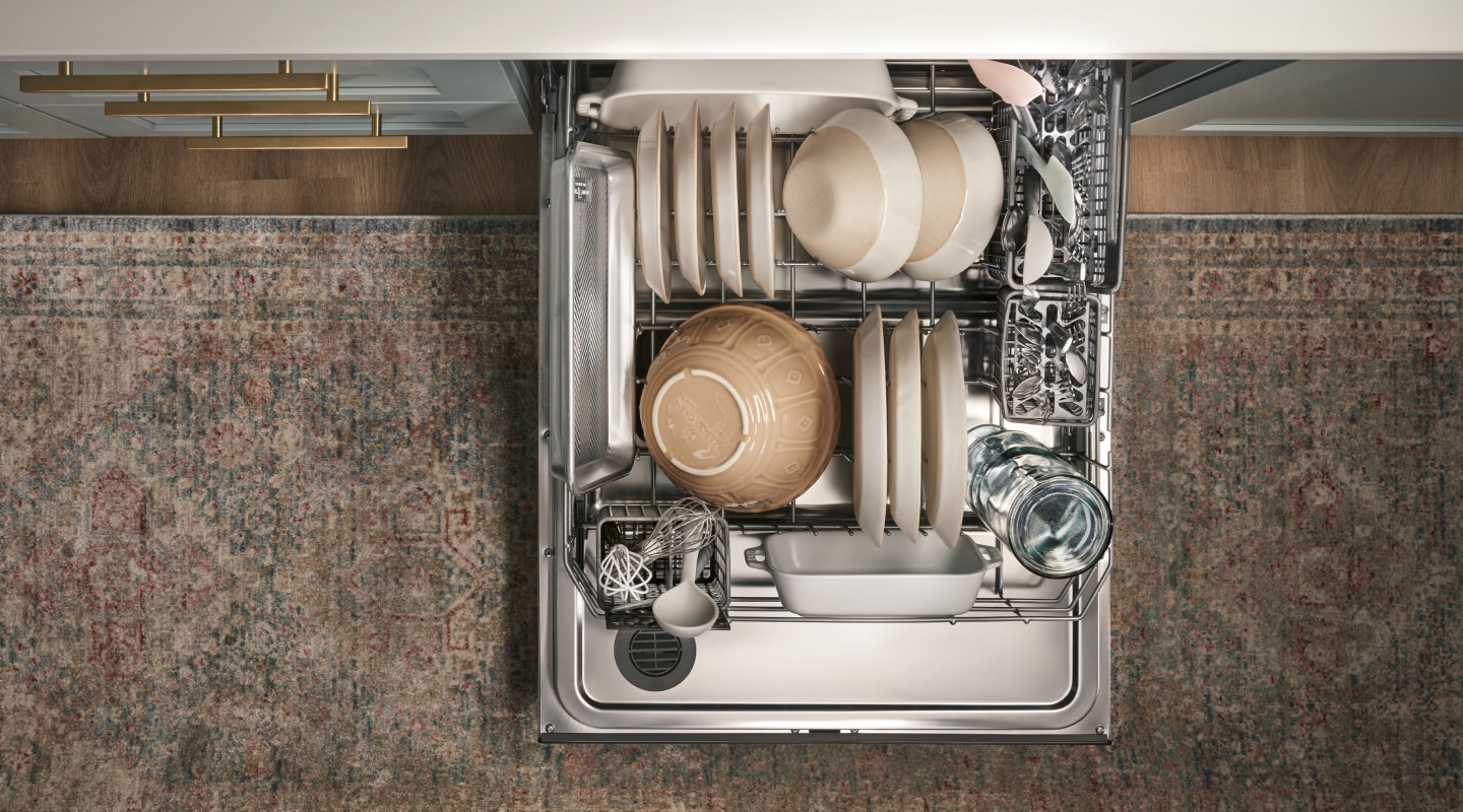 Clean dishes in a dishwasher Clean dishes in a dishwasher