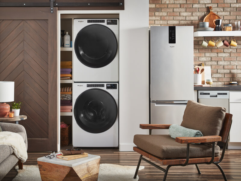 Stackable washer and dryer in a laundry closet Stackable washer and dryer in a laundry closet