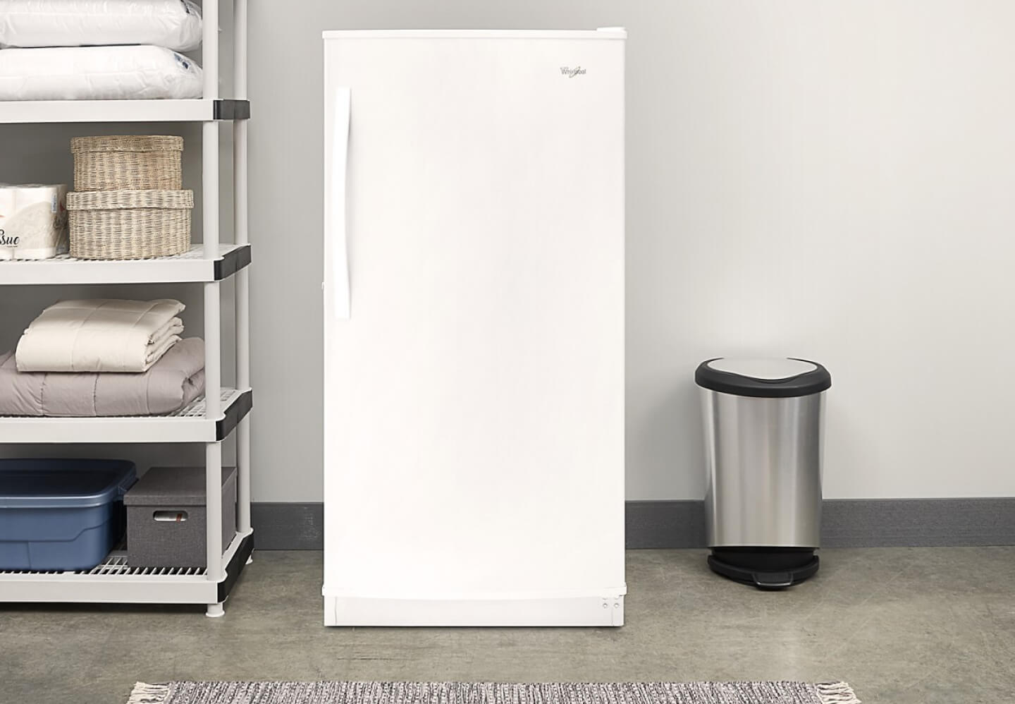 A Whirlpool® Upright Freezer in a storage room