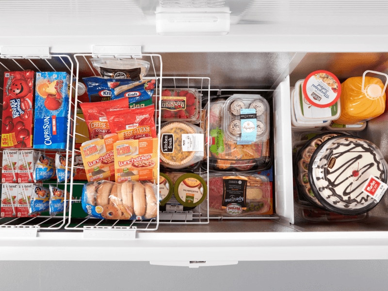 Aerial view of an open white chest freezer Aerial view of an open white chest freezer