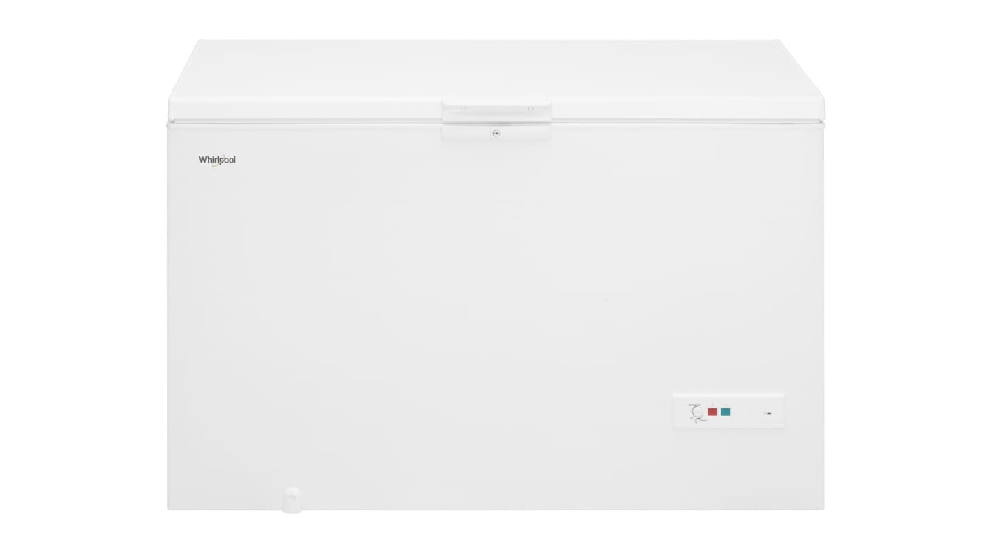 A white chest freezer against a white background A white chest freezer against a white background