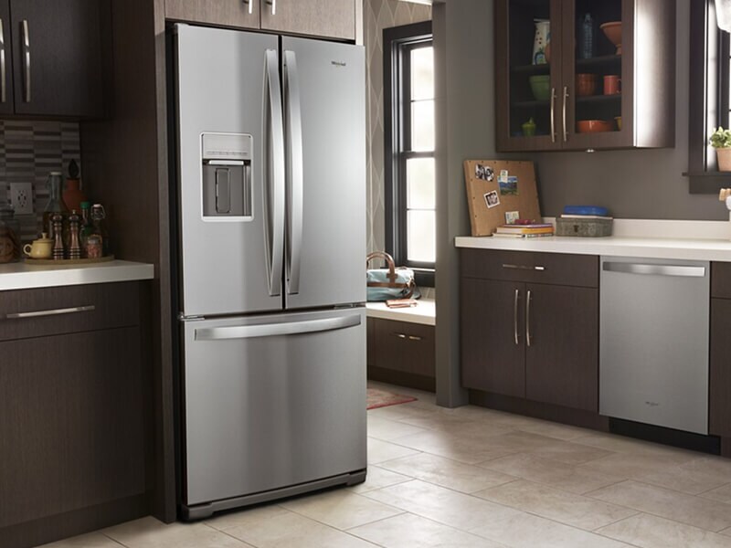 Whirlpool® appliances in a brown, modern kitchen