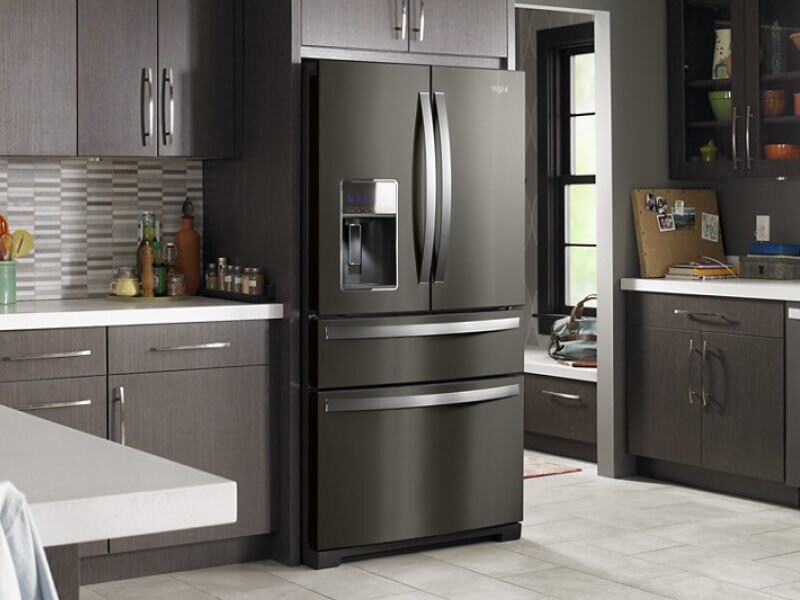 Interior of a family’s kitchen with a 4-door refrigerator