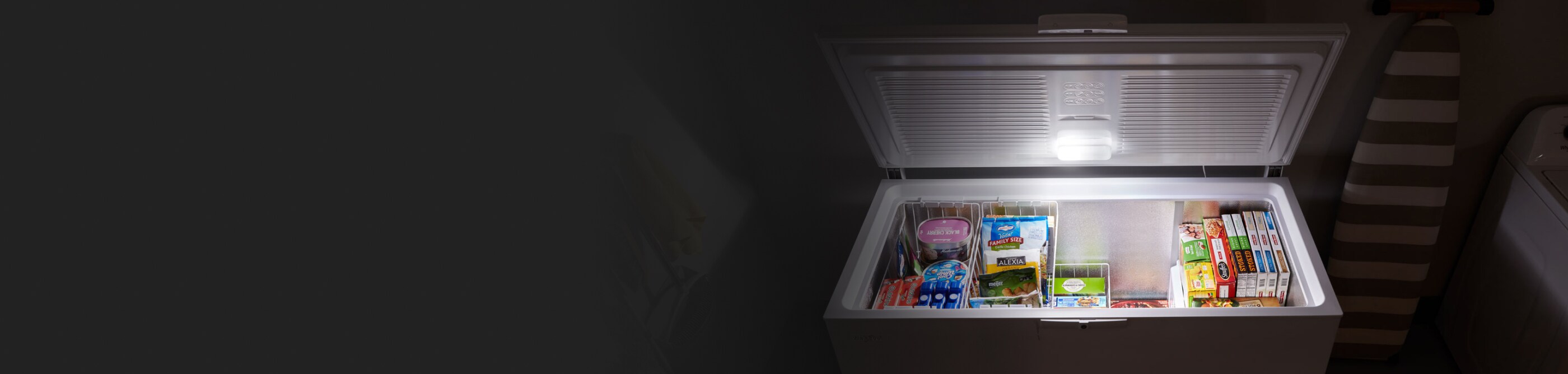 Various frozen items in a chest freezer