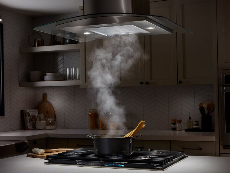 Smoke from a pot being drawn up into a range hood Smoke from a pot being drawn up into a range hood