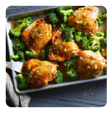 Chicken thighs and broccoli on a sheet pan Chicken thighs and broccoli on a sheet pan