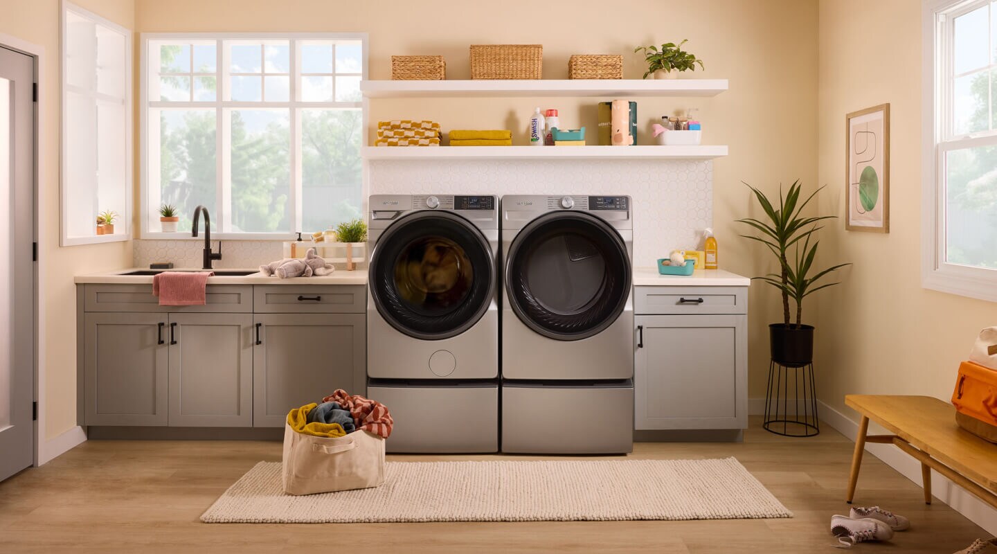 A Whirlpool® Washer and Dryer in a light colored laundry area A Whirlpool® Washer and Dryer in a light colored laundry area