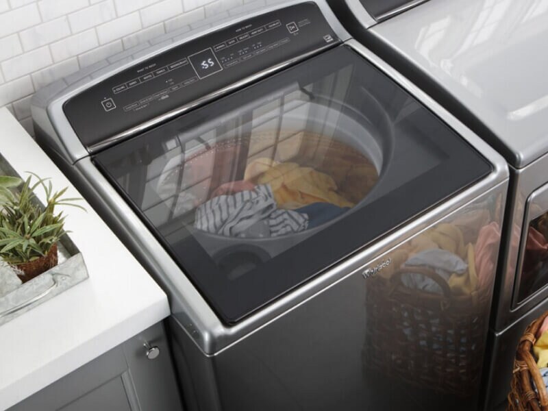 A Whirlpool®  Washer and Dryer placed side by side