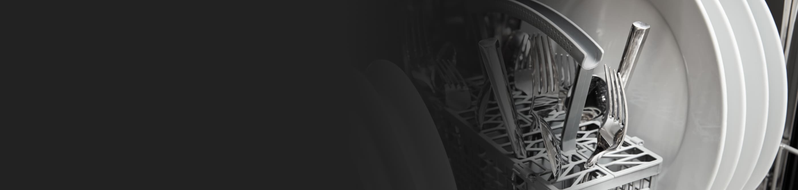 A closeup of the interior of a Whirlpool® dishwasher.