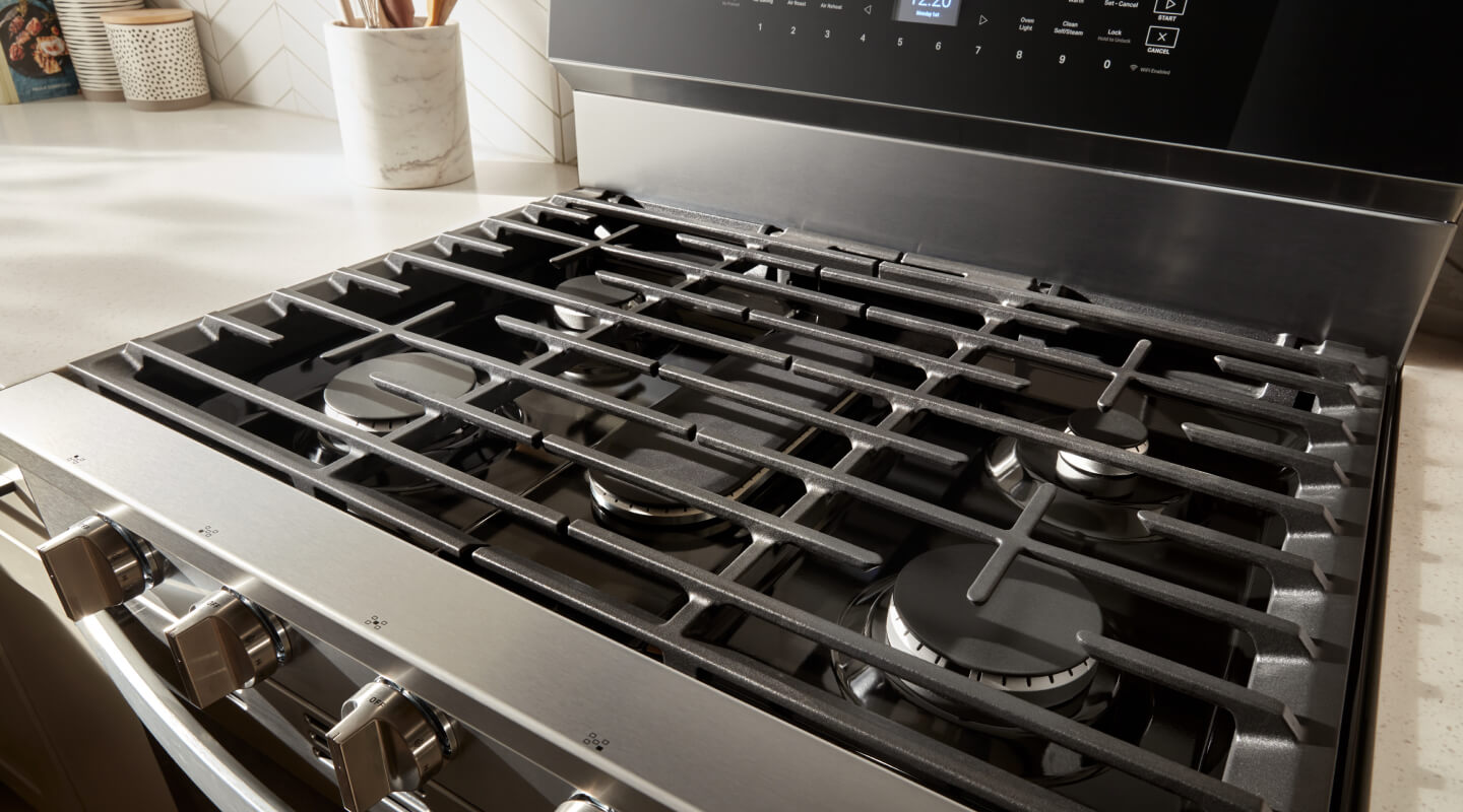 Cast iron grates on gas stainless steel range