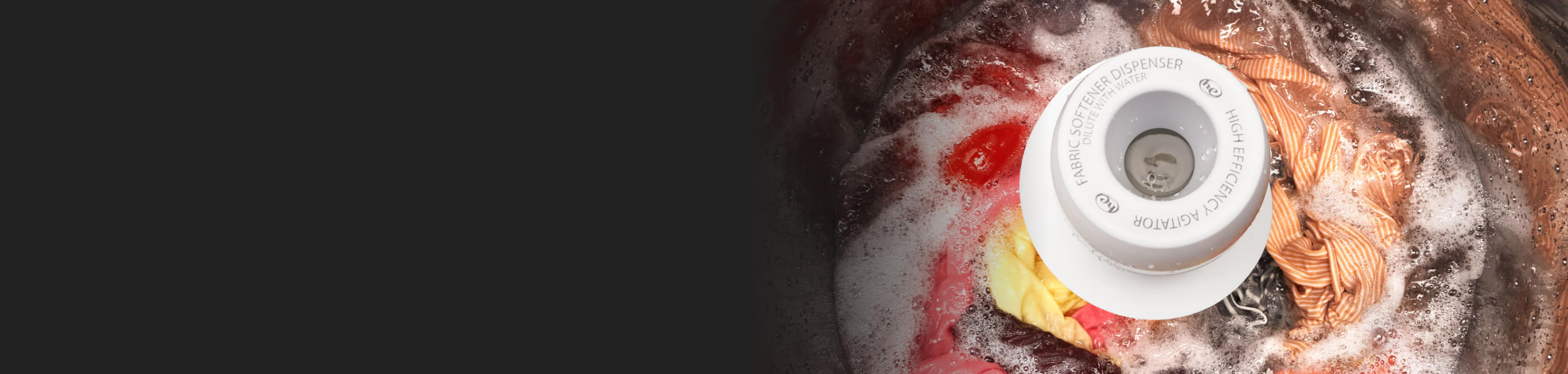 Clothes inside a top loading Whirlpool® washer