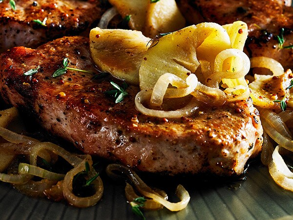 Steak with caramelized onions on top