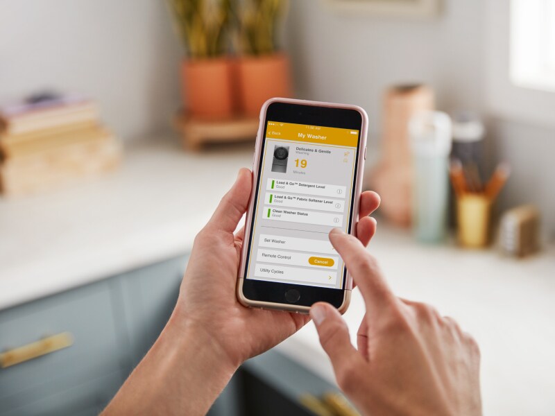 Person using Whirlpool® App Person using Whirlpool® App