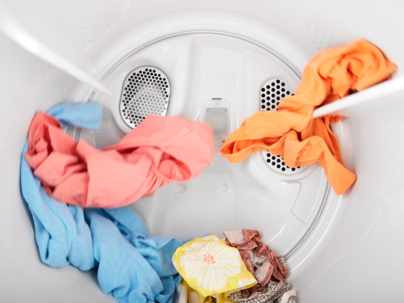 Clothes tumbling in dryer Clothes tumbling in dryer