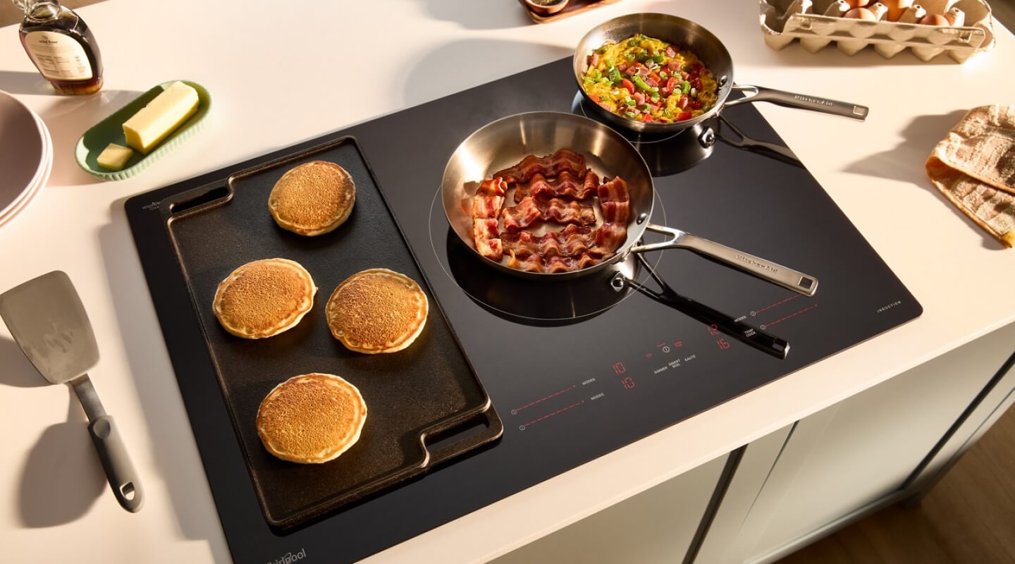 Breakfast cooking on a glass electric cooktop