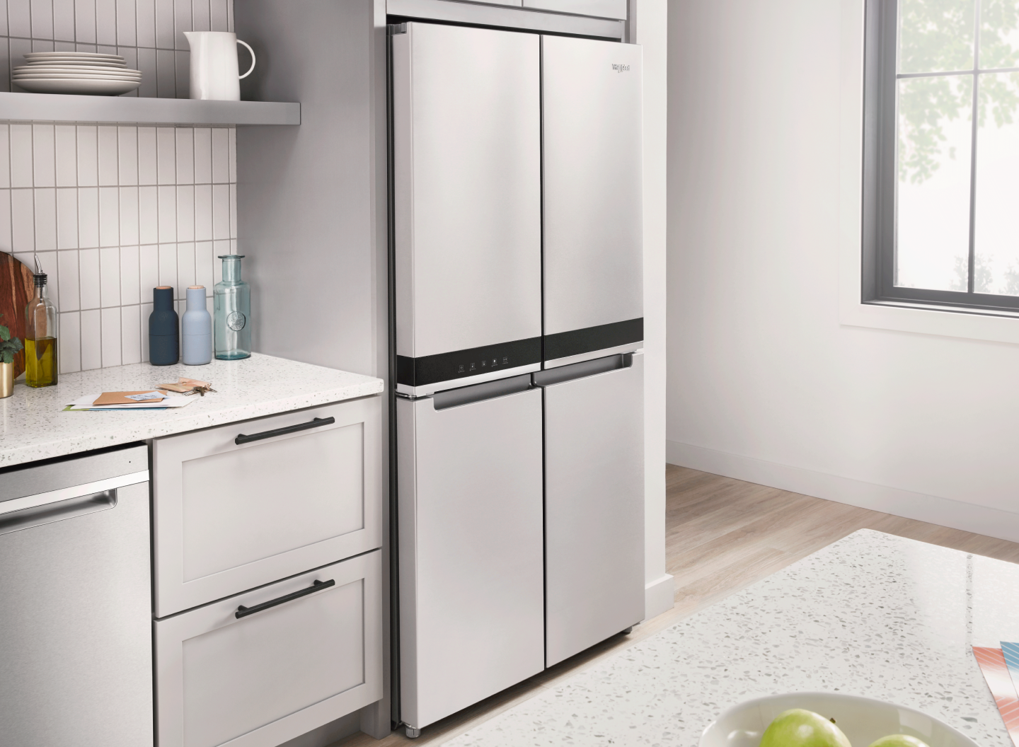 A modern kitchen with a 4-door fridge