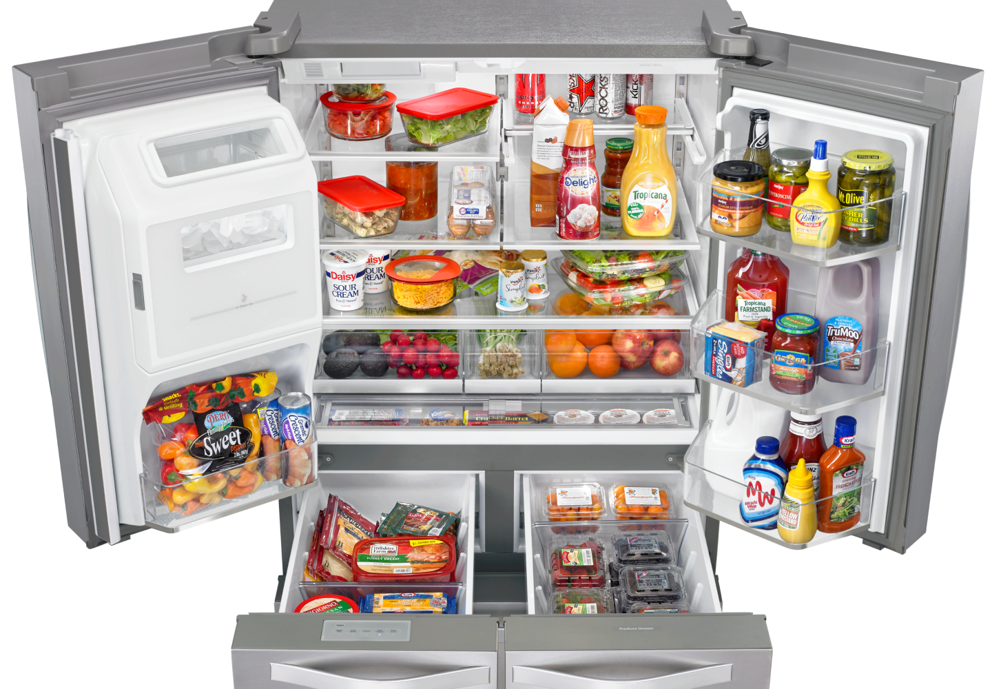 Refrigerator with drawers and doors open, full of food and condiments Refrigerator with drawers and doors open, full of food and condiments
