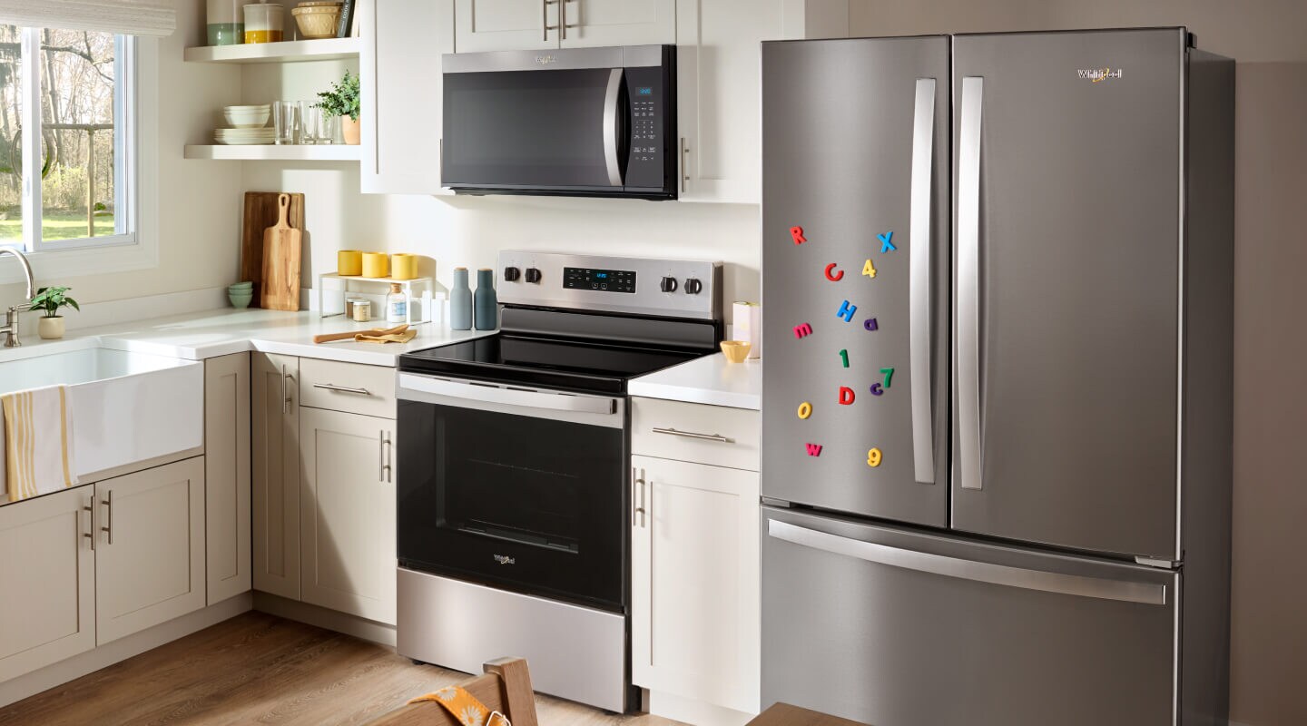 The inside of a kitchen with several Whirlpool brand appliances