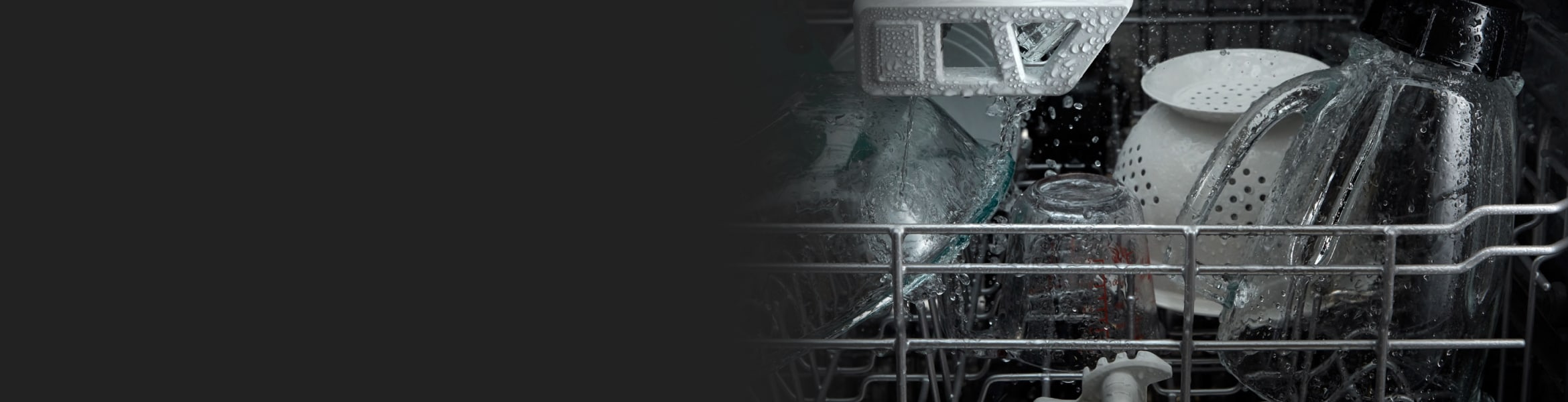 Dishes in dishwasher during wash cycle