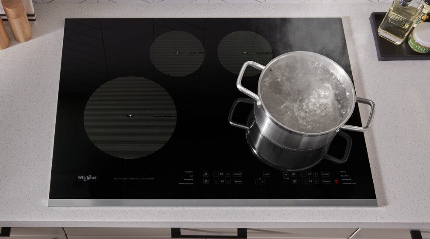 Pot of water boiling on a Whirlpool® induction cooktop