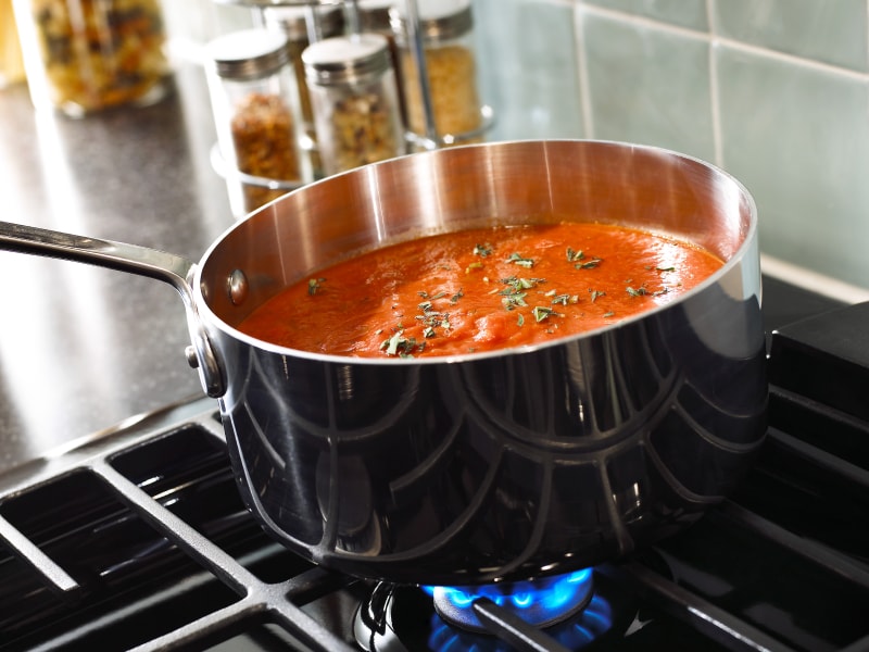 Stainless steel pan simmering on a Whirlpool® Gas Range Stainless steel pan simmering on a Whirlpool® Gas Range