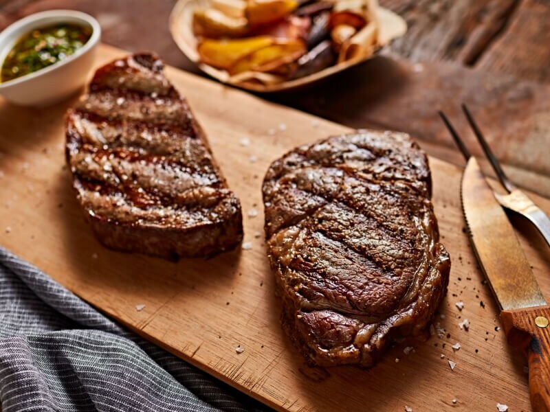 Grilled meat on a cutting board