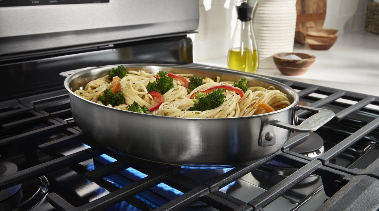 Pasta and vegetables in a pan on the stove