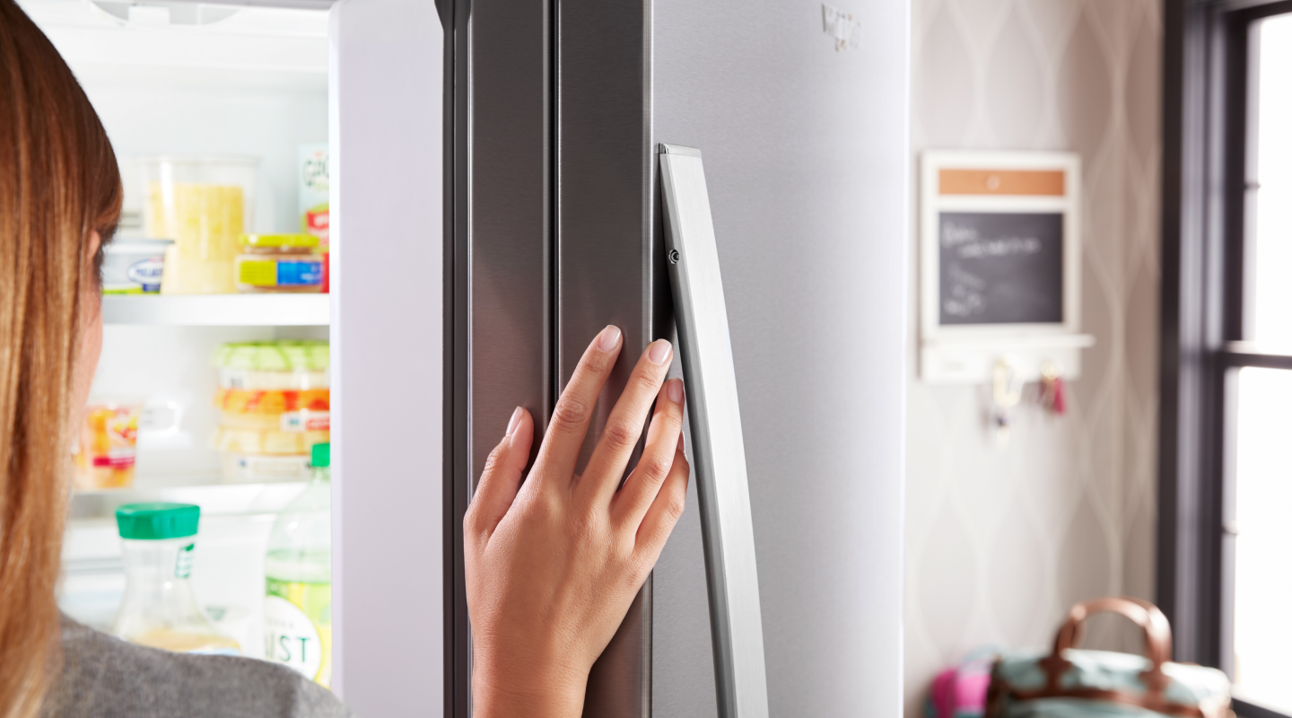 Person opening fridge Person opening fridge