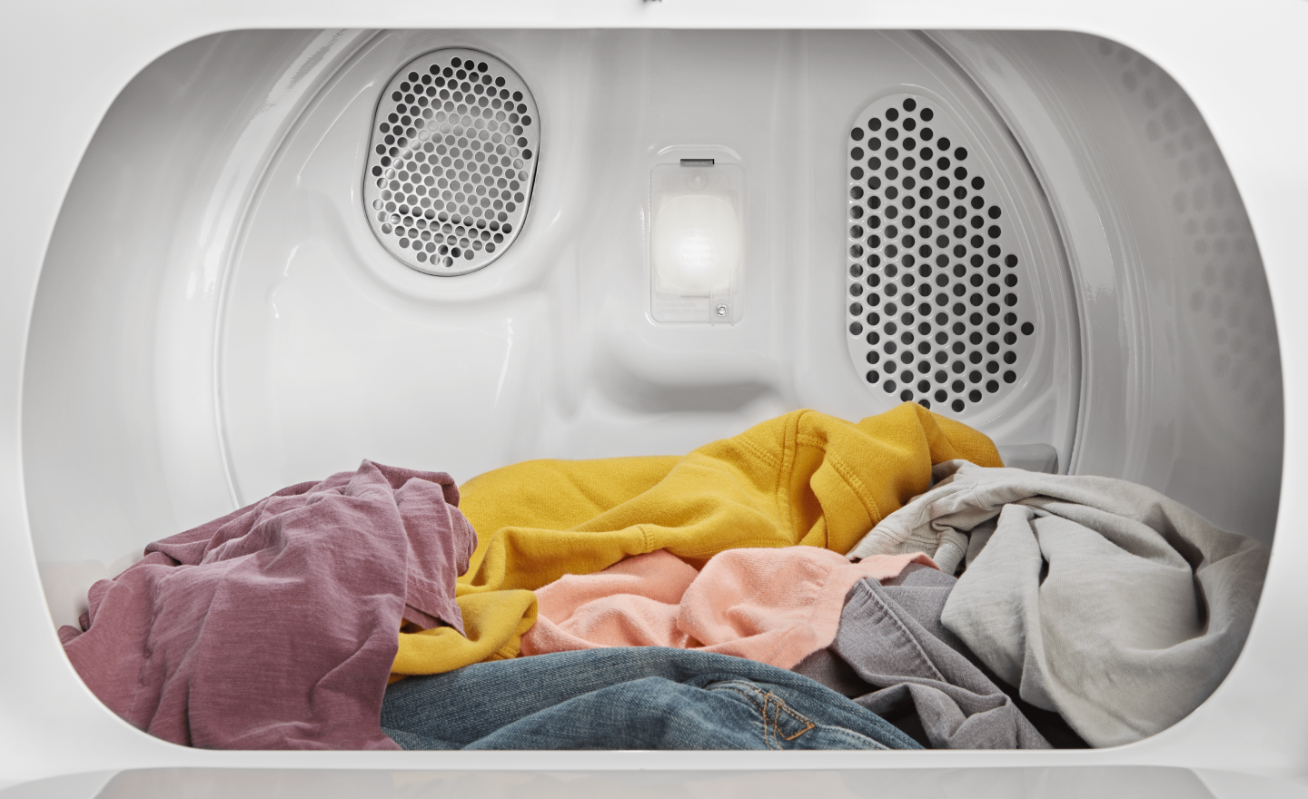 A load of laundry in a Whirlpool® Dryer. A load of laundry in a Whirlpool® Dryer.