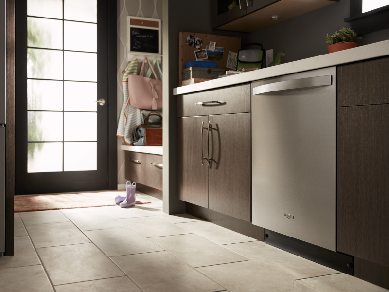 Stainless steel Whirlpool® top control dishwasher in a kitchen Stainless steel Whirlpool® top control dishwasher in a kitchen