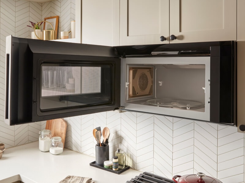 Over-the-range microwave with an open door Over-the-range microwave with an open door