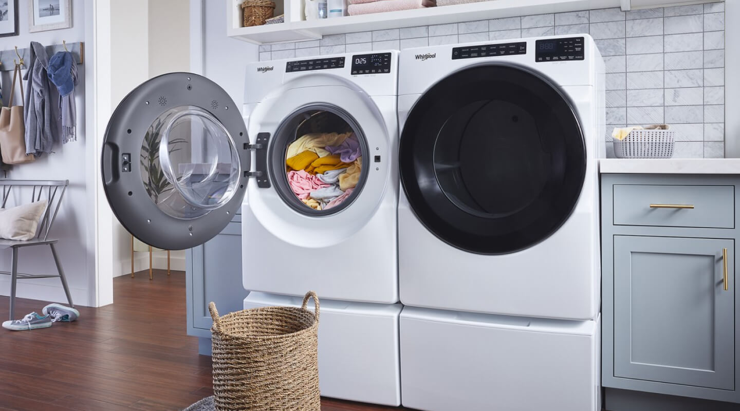 A white Whirlpool® Front Load Washer and Dryer set
