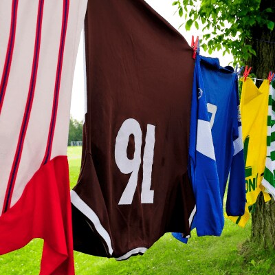 Jerseys hanging on a clothesline