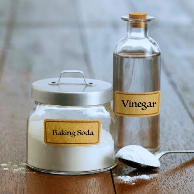 Baking soda and vinegar in containers