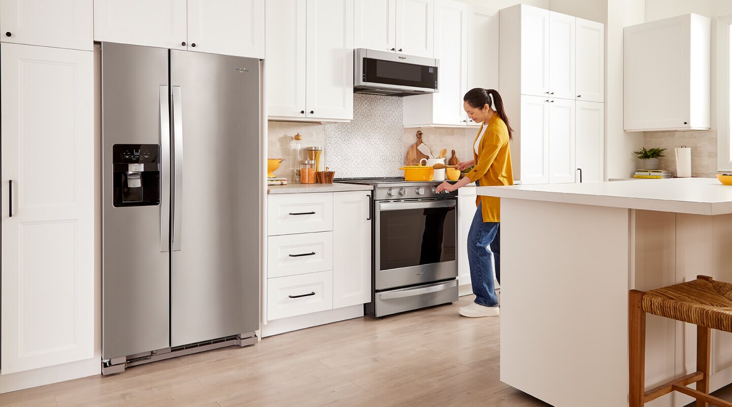 A bright kitchen with a Whirlpool® Side-by-Side Refrigerator 
