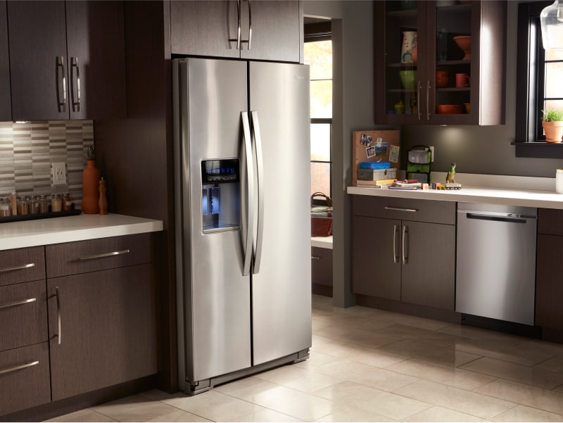 A counter-depth side-by-side refrigerator in a kitchen