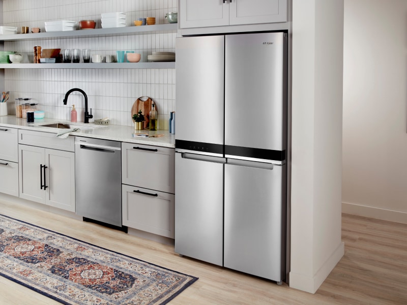 4-door refrigerator in a bright white kitchen 4-door refrigerator in a bright white kitchen