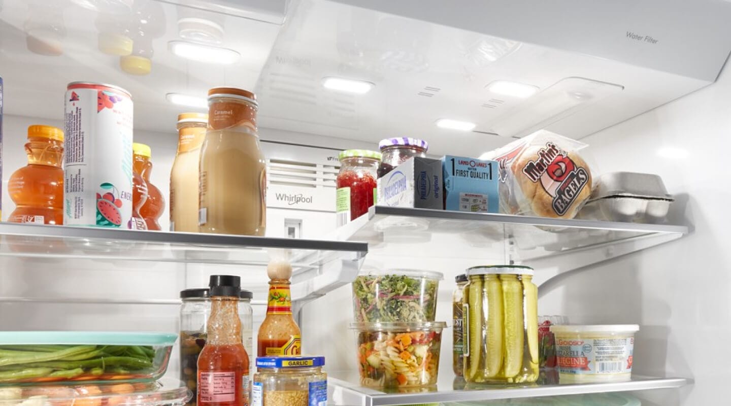 Shelves full of food inside a Whirlpool® Refrigerator Shelves full of food inside a Whirlpool® Refrigerator