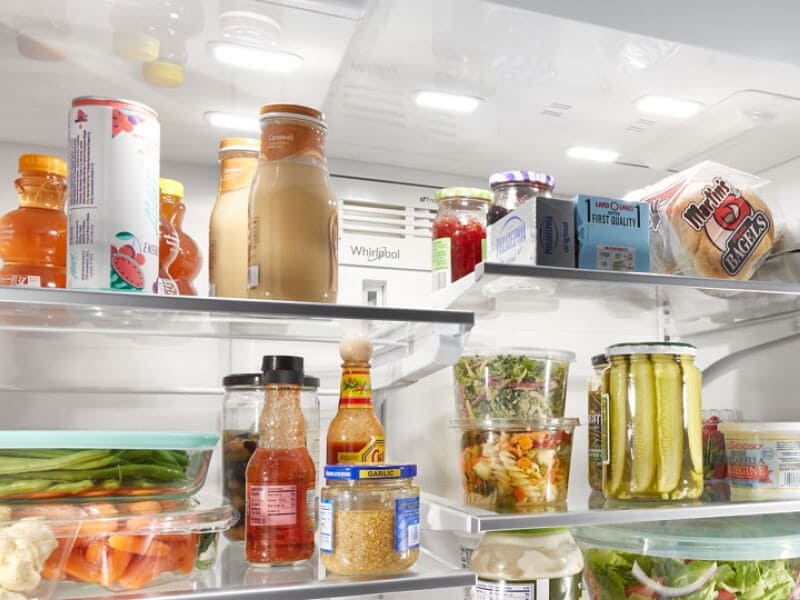 Shelves full of food inside a Whirlpool® Refrigerator Shelves full of food inside a Whirlpool® Refrigerator