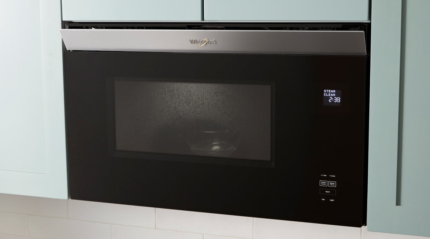 Modern kitchen cabinets with a Whirlpool® Microwave